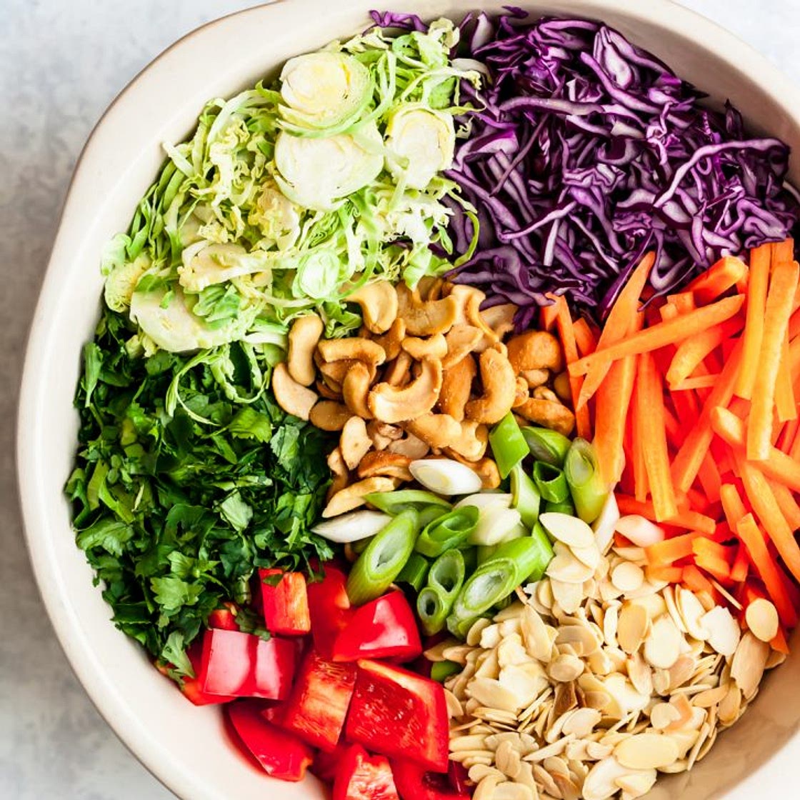 Cashew Crunch Shredded Brussels Sprouts Salad with Sesame Ginger Dressing