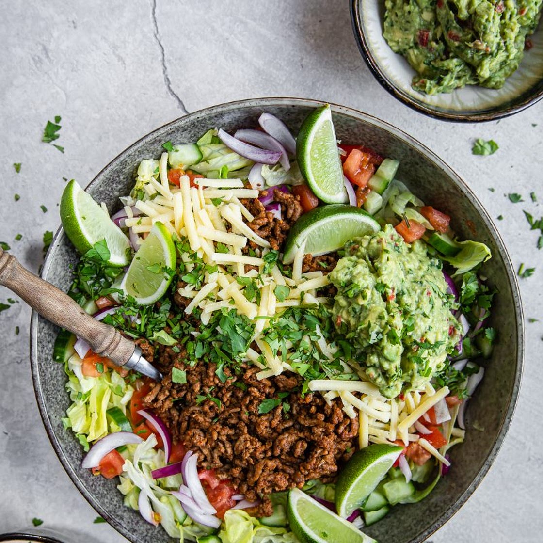 Keto taco salad with salsa dressing and guacamole