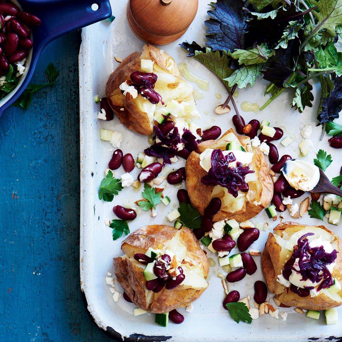 Baked potatoes with kidney beans, almonds & sauerkraut