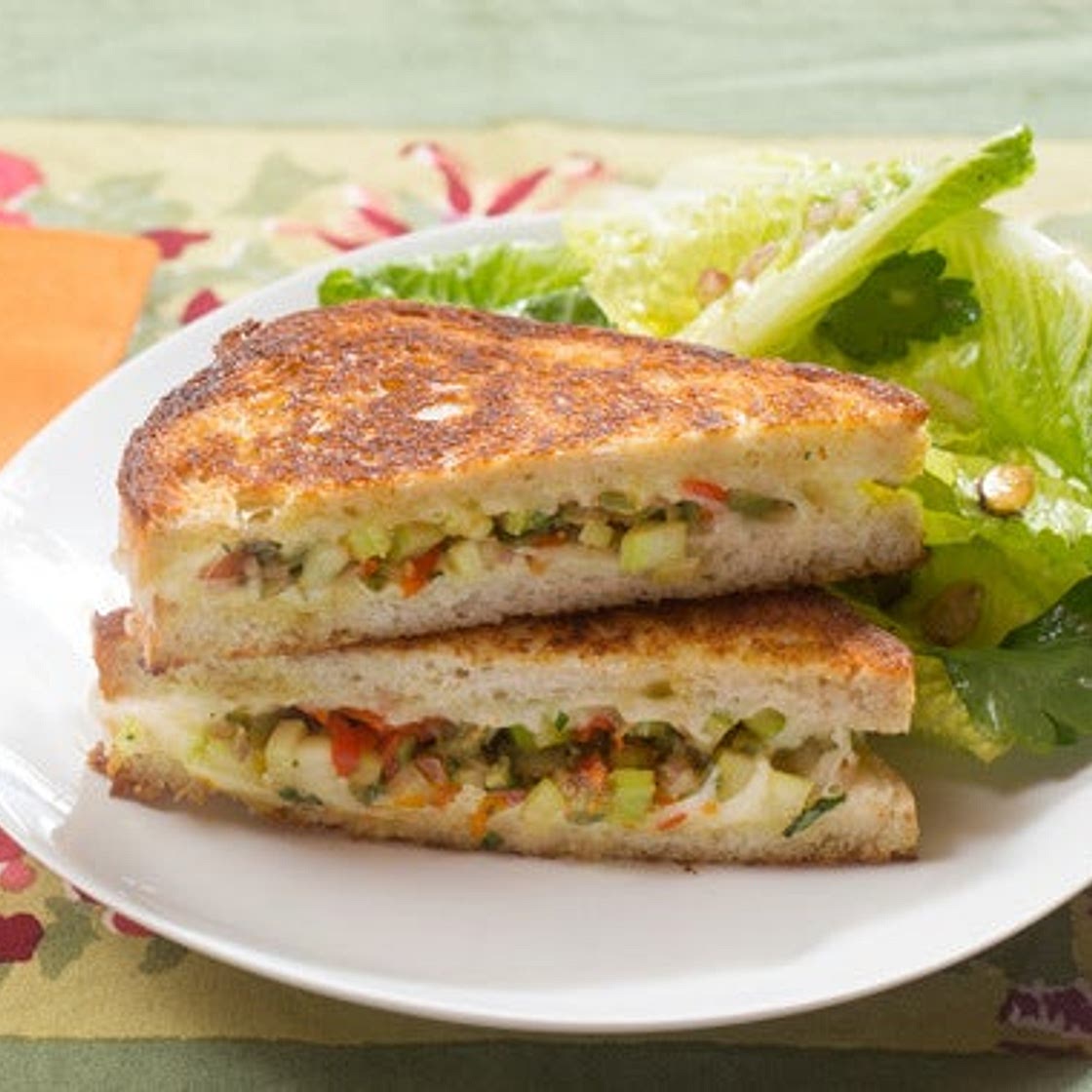 Muffuletta-Style Grilled Cheese Sandwiches with Baby Romaine & Pistachio Salad