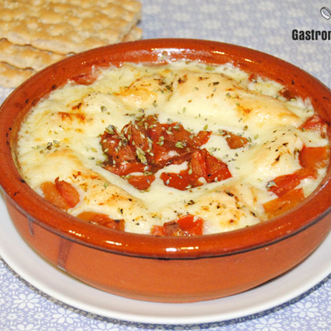 Provolone al horno con tomate y orégano