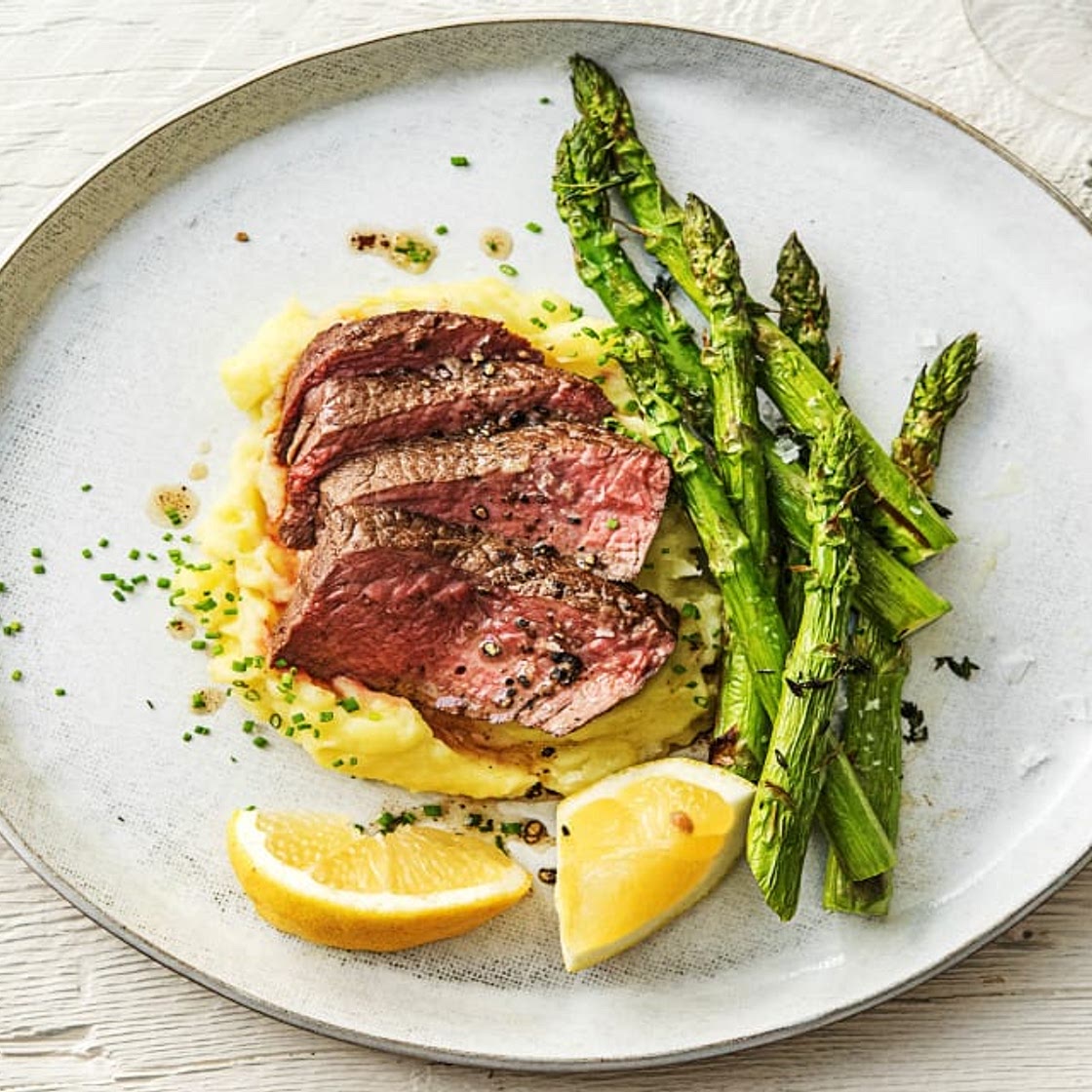 Butter-Basted Rib-Eye Steak with Thyme-Infused Mashed Potatoes and Asparagus