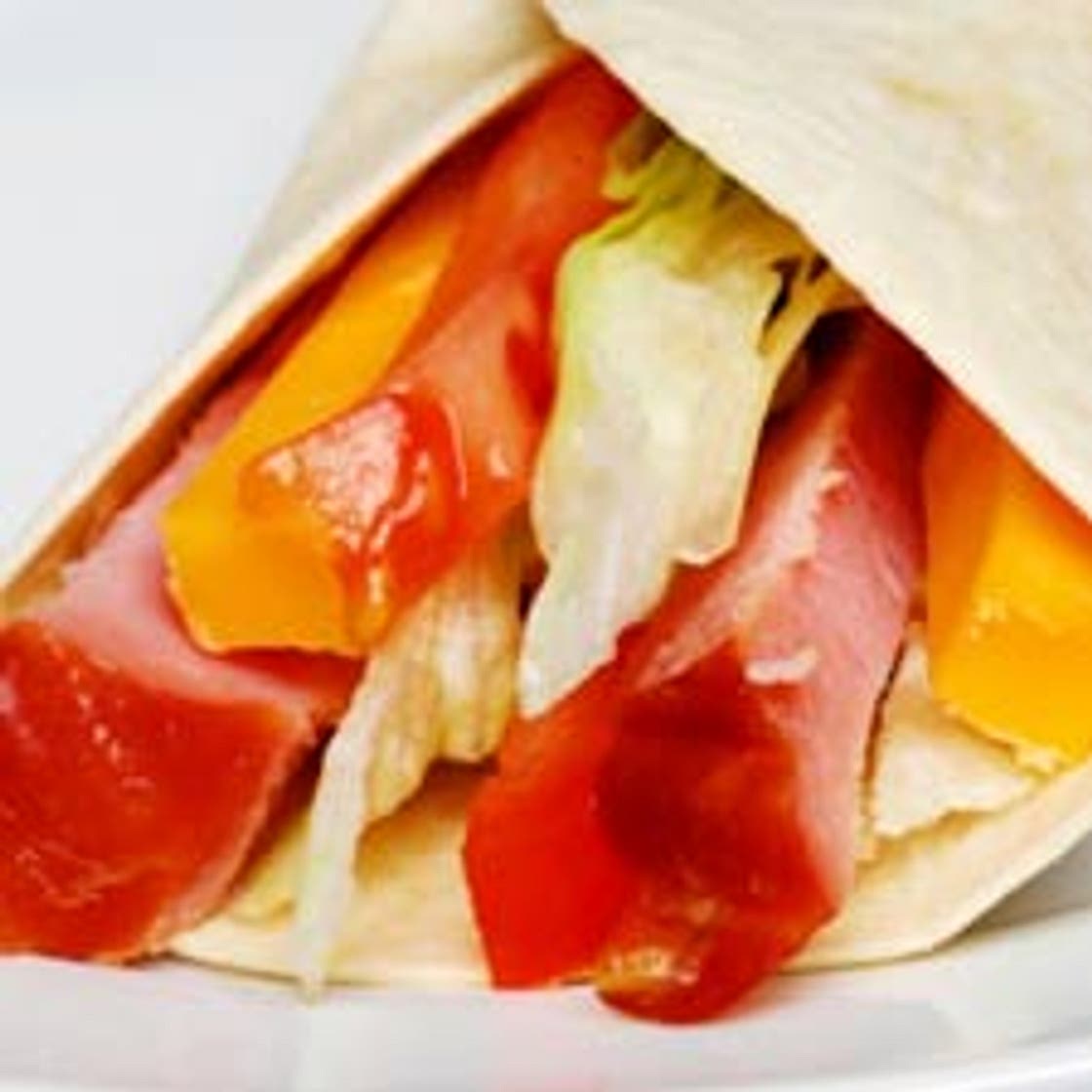 Pan de pita con jamón dulce, manzana y queso