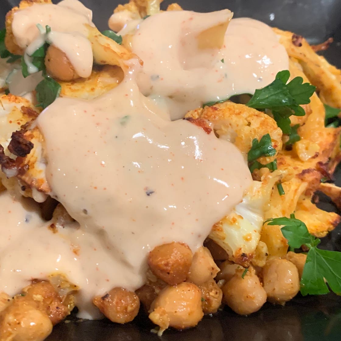 Roast cauliflower and chickpeas with a tahini dressing 