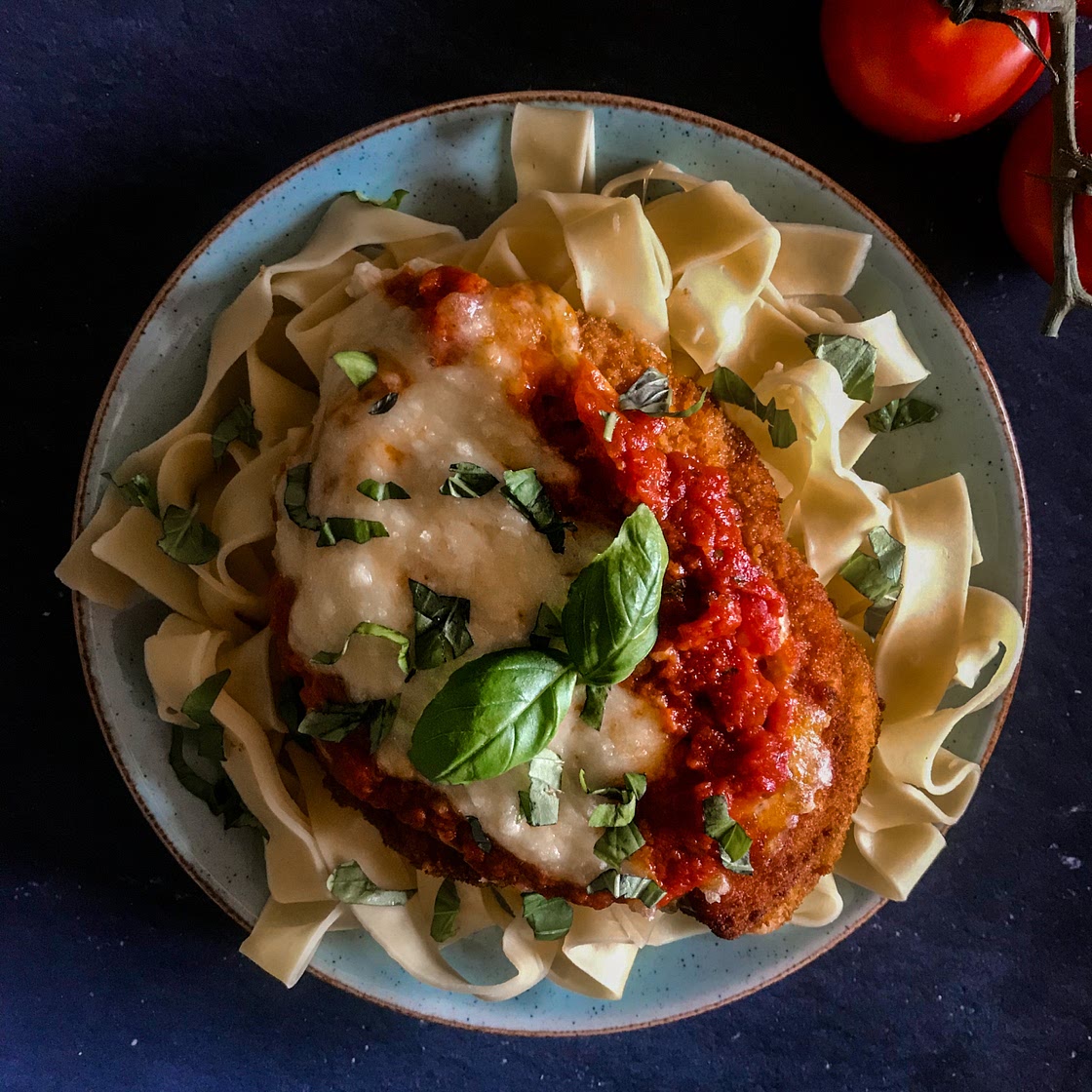 Chicken parmigiana served on tagliatelle 