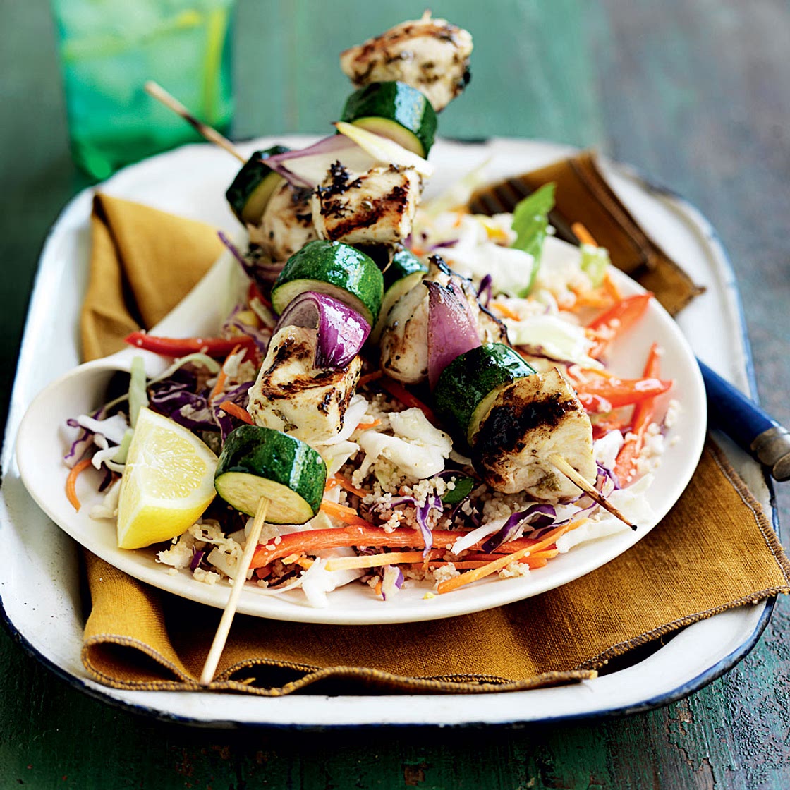 Zucchini and lemon chicken skewers with shredded vegetable couscous