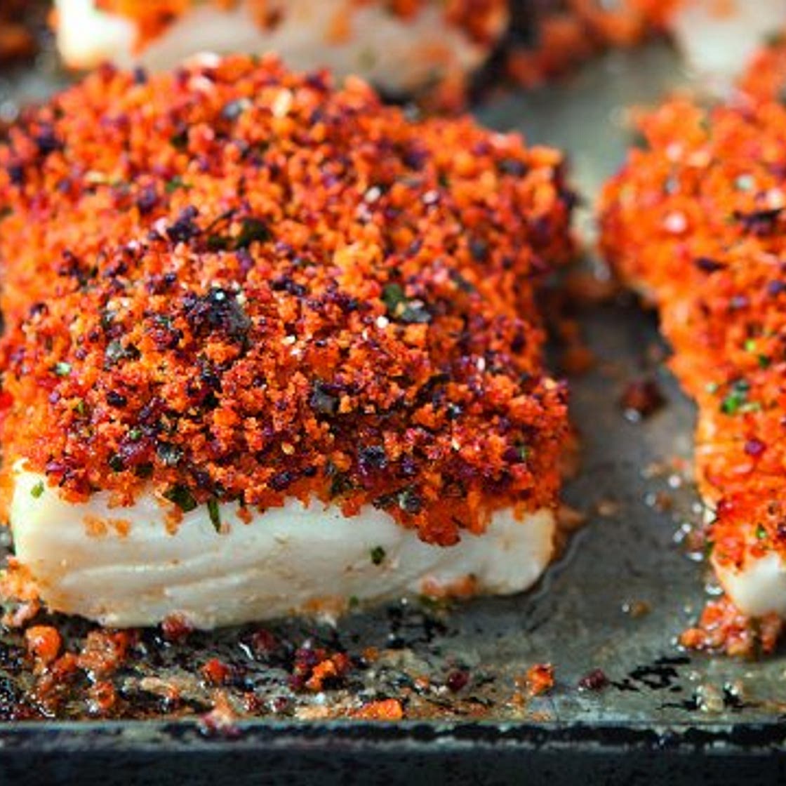 Baked fish with chorizo crust