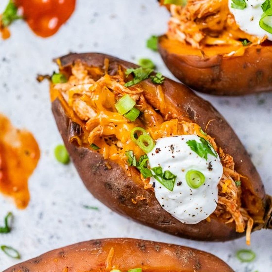 Slow Cooker Loaded Enchilada Chicken Stuffed Sweet Potatoes