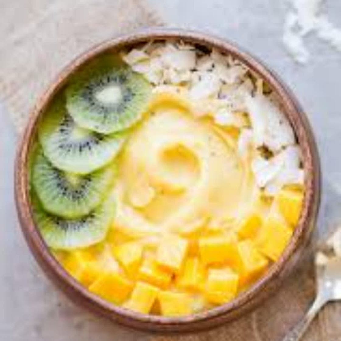 Mango pineapple coconut smoothie bowls