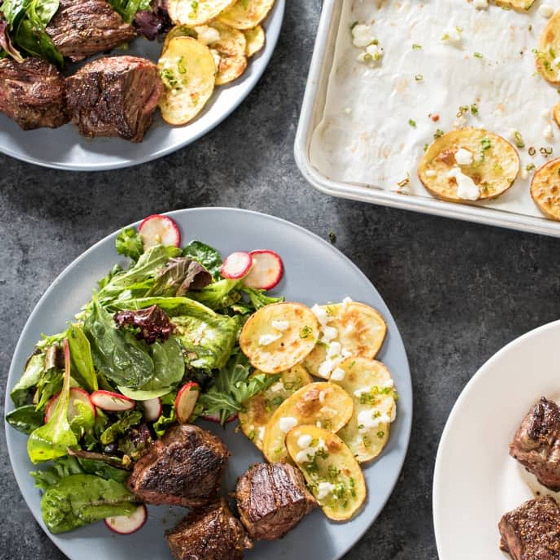 Skillet Steak Tips with Roasted Feta Potatoes and Mesclun Salad