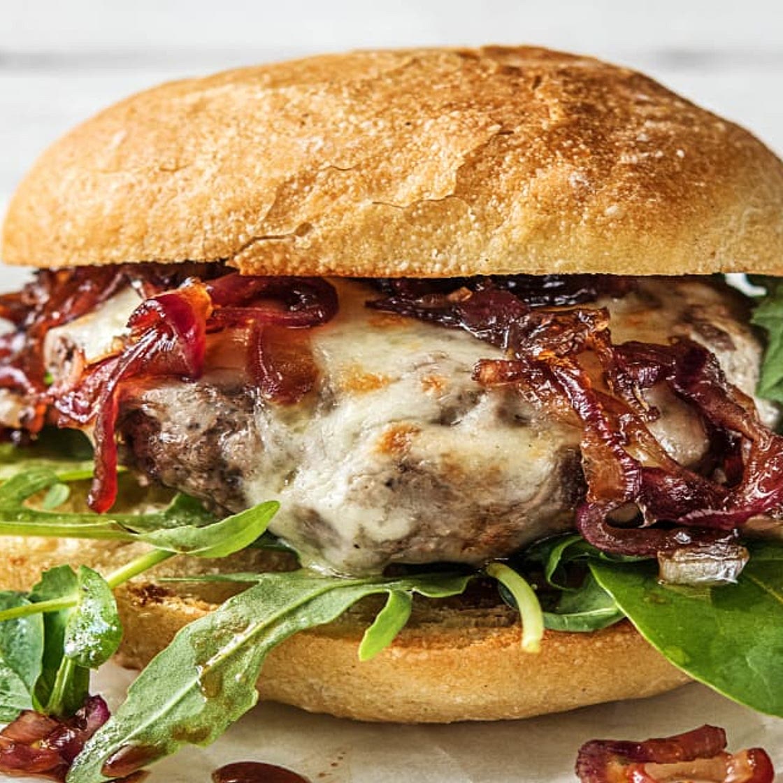 Melty Mozzarella Burgers with Caramelized Onion and Balsamic Greens on Ciabatta