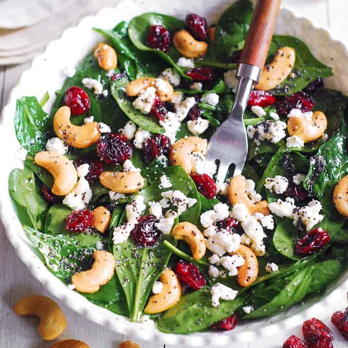 Cranberry Spinach Salad with Cashews and Goat Cheese