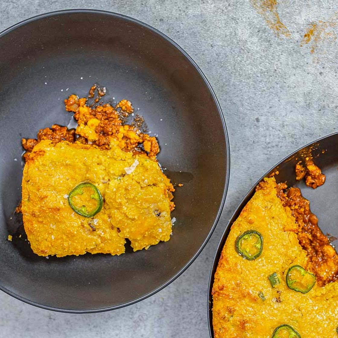 Cowboys Pie – Jalapeño Cheddar Cornbread on Top, Chili on Bottom