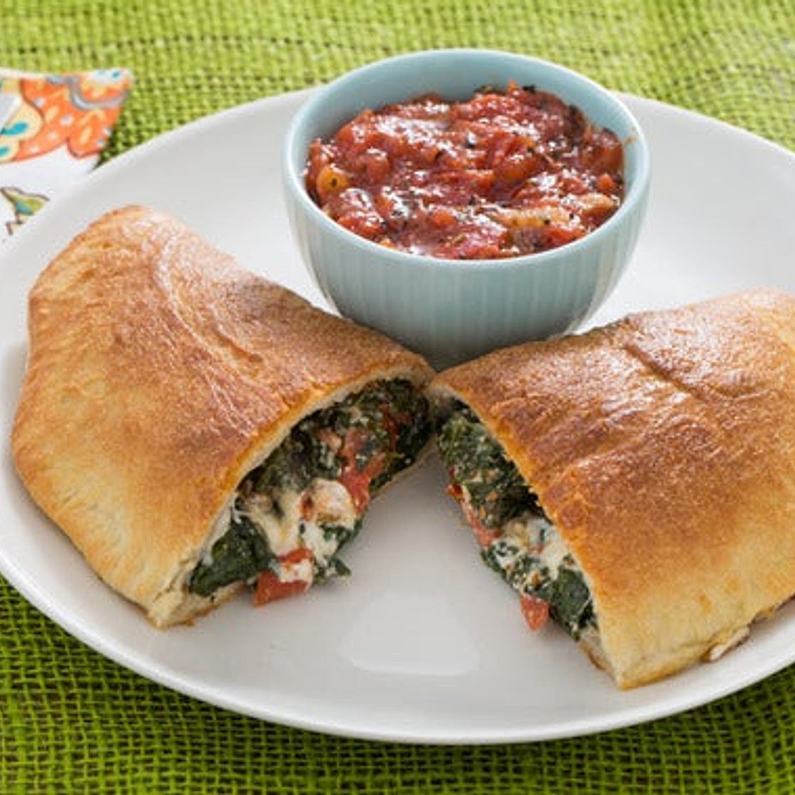 Three Cheese Calzones with Kale & Tomato Sauce