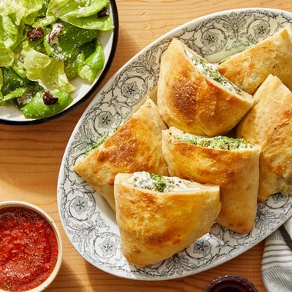 Cheesy Vegetable Calzones with Tomato Dipping Sauce & Caesar Salad