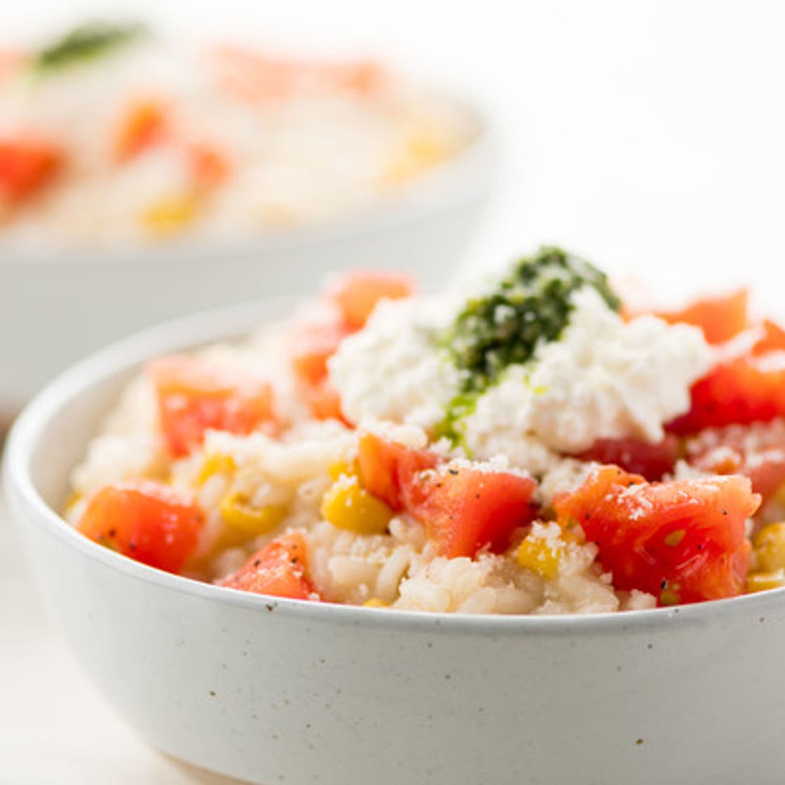 Burrata & Pesto Risotto with tomato vinaigrette and roasted corn