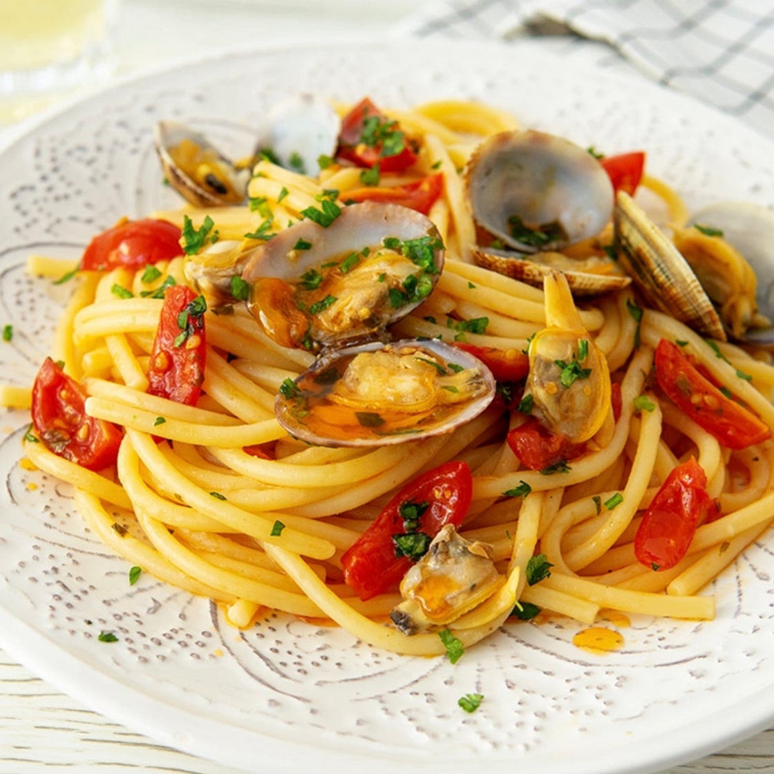 Spaghetti con vongole e pomodorini