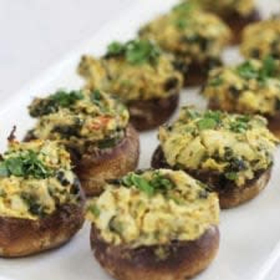 Spinach and artichoke humus stuffed mushrooms 