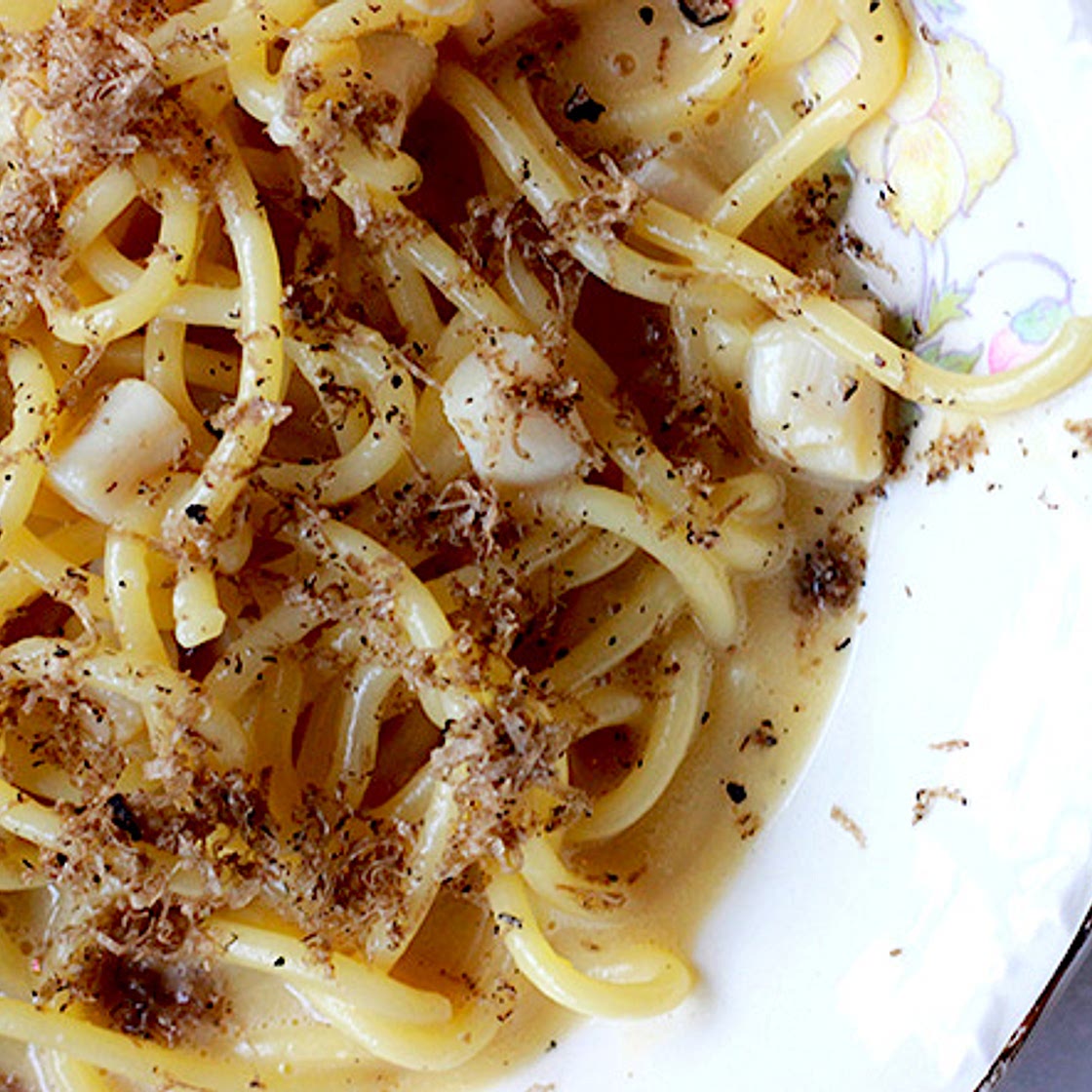 Spaghetti with White Miso, Egg Yolks, Bay Scallops, and Black Truffles