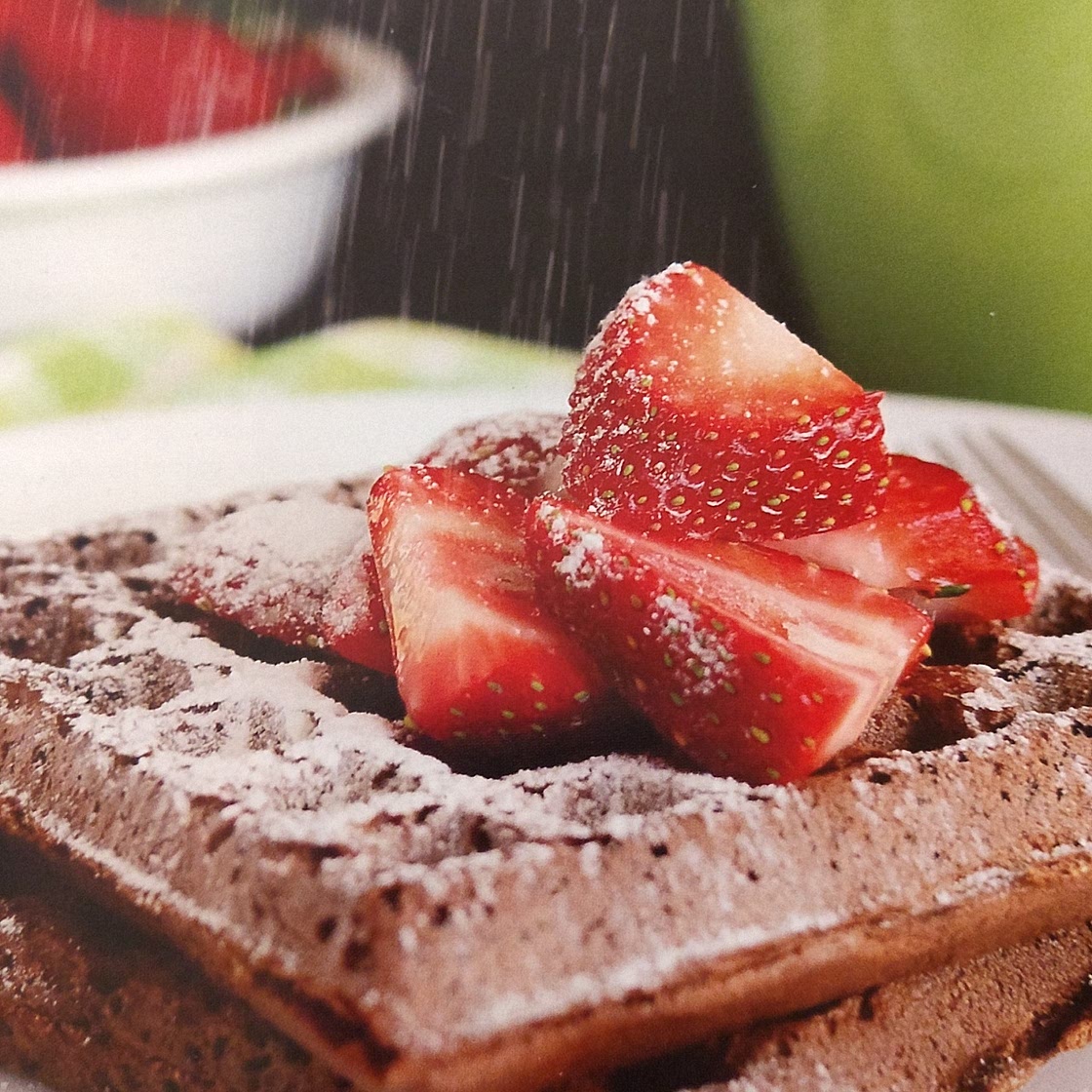 Chocolate waffles with strawberries