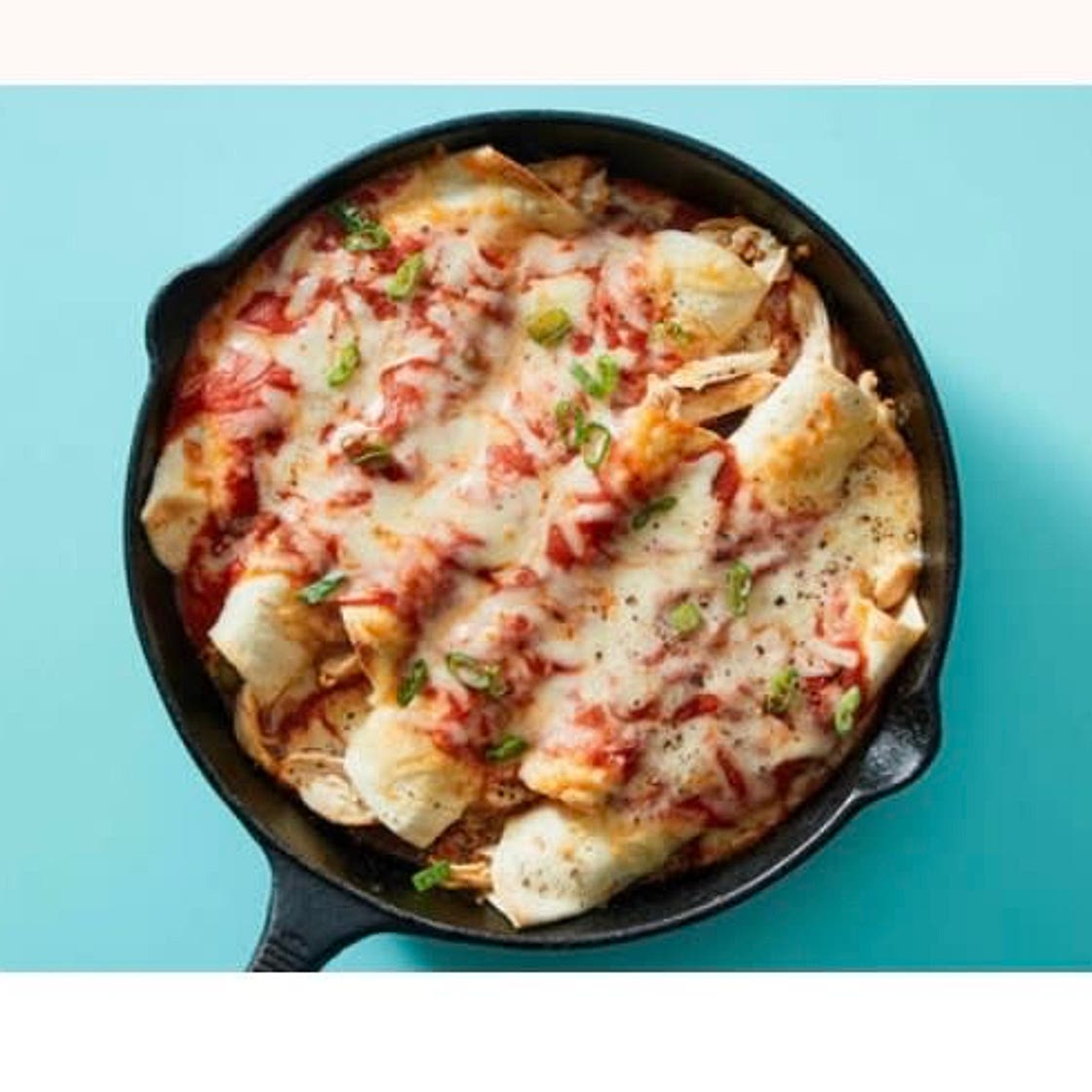 Cheesy Skillet Pulled Chicken Enchiladas with Scallions