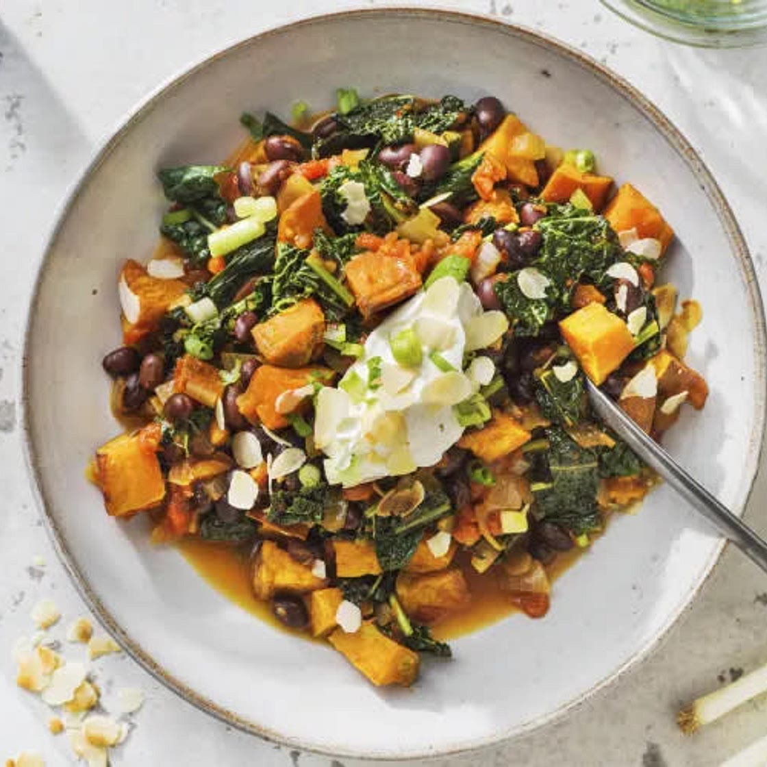 Black bean & Sweet Potato Stew with Cavolo Nero & Harrissa