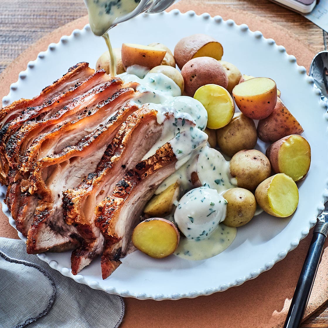 Danish stegt flæsk med persillesovs (grilled pork belly with parsley sauce)
