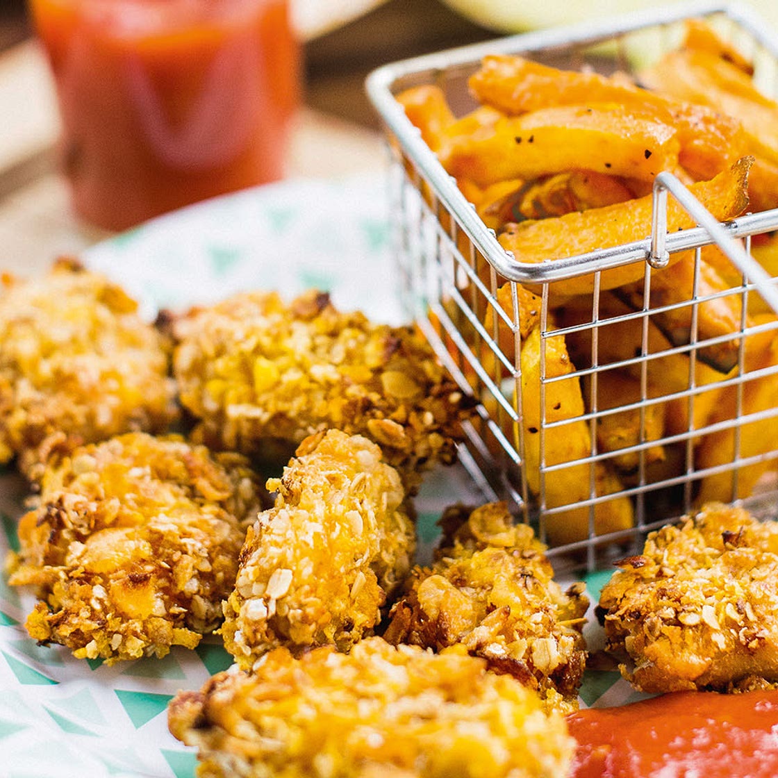 Hendl-Nuggets mit Pommes und Ketchup