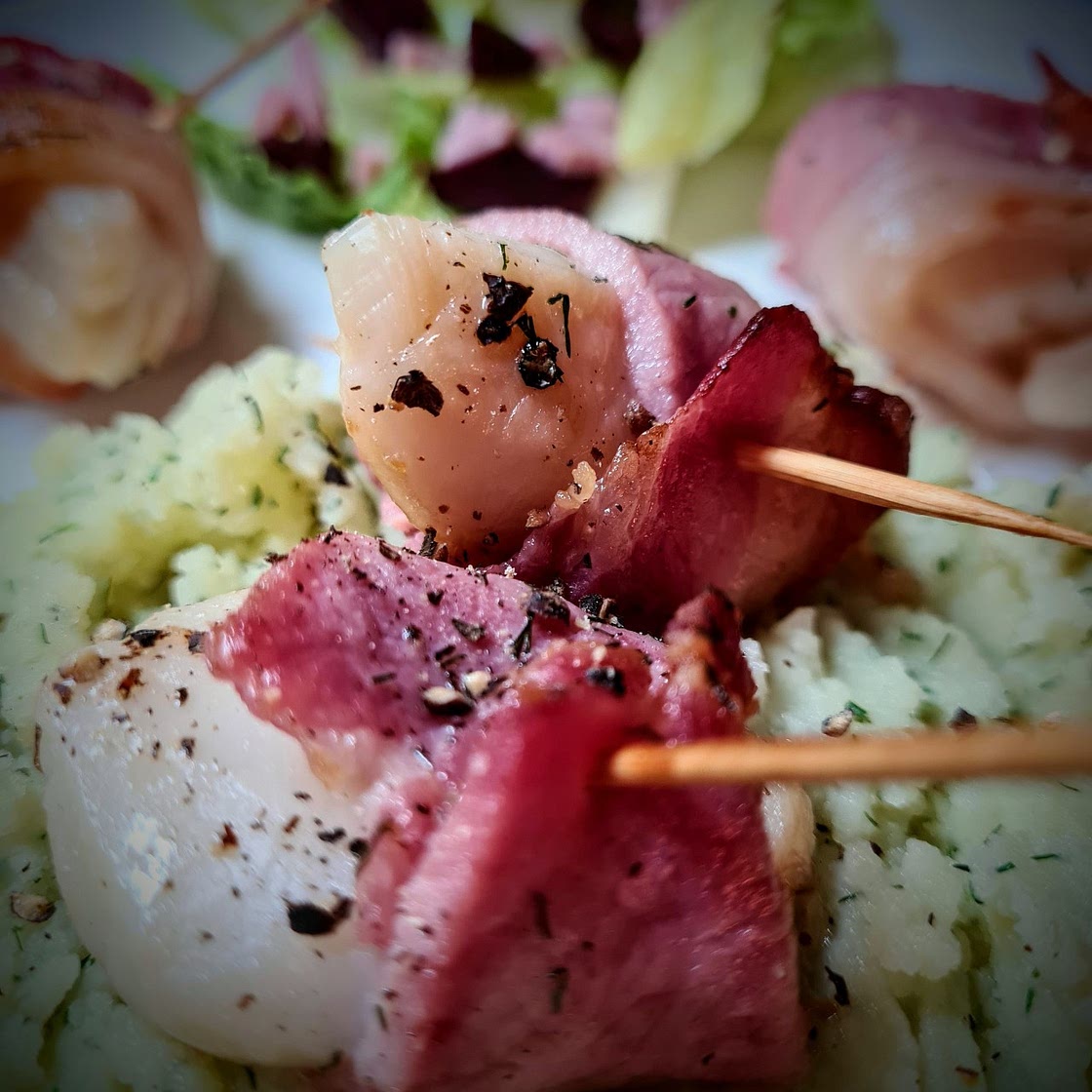 Bacon wrapped scallops with dill & butter mash