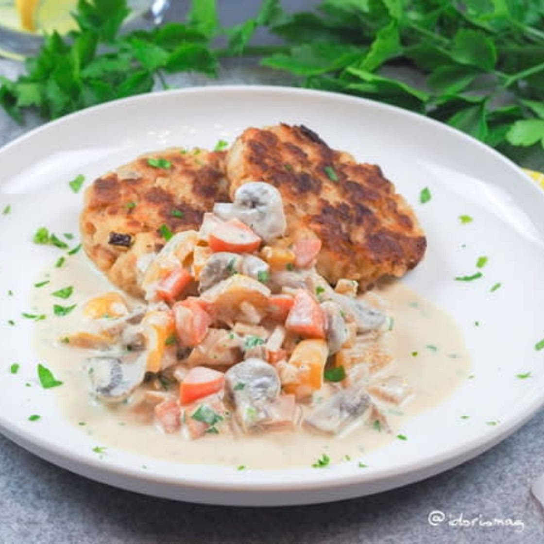 Pan-fried bread dumplings with mushroom vegetable cream sauce