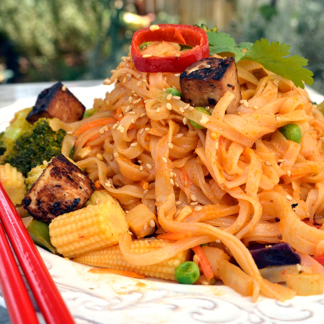 Vegan Red Coconut Curry Pad Thai Noodles with Crispy Garlic Tofu