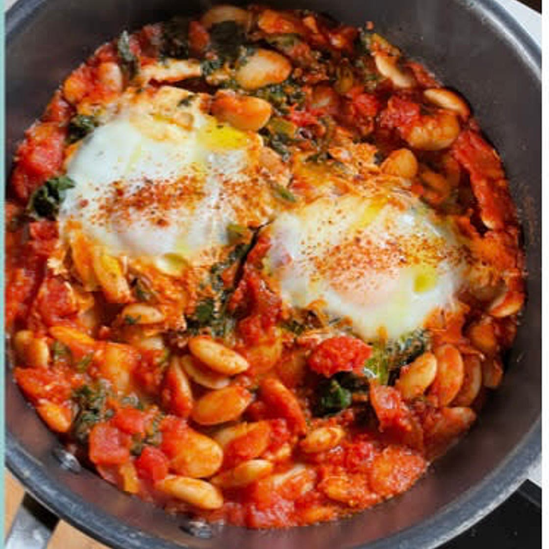 Harissa beans with poached eggs