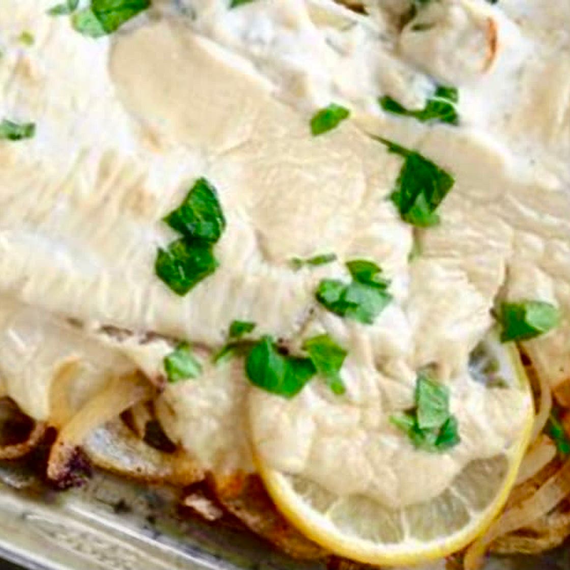 Baked Fish with Tahini Sauce. (سمك بالطحينة بالفرن)
