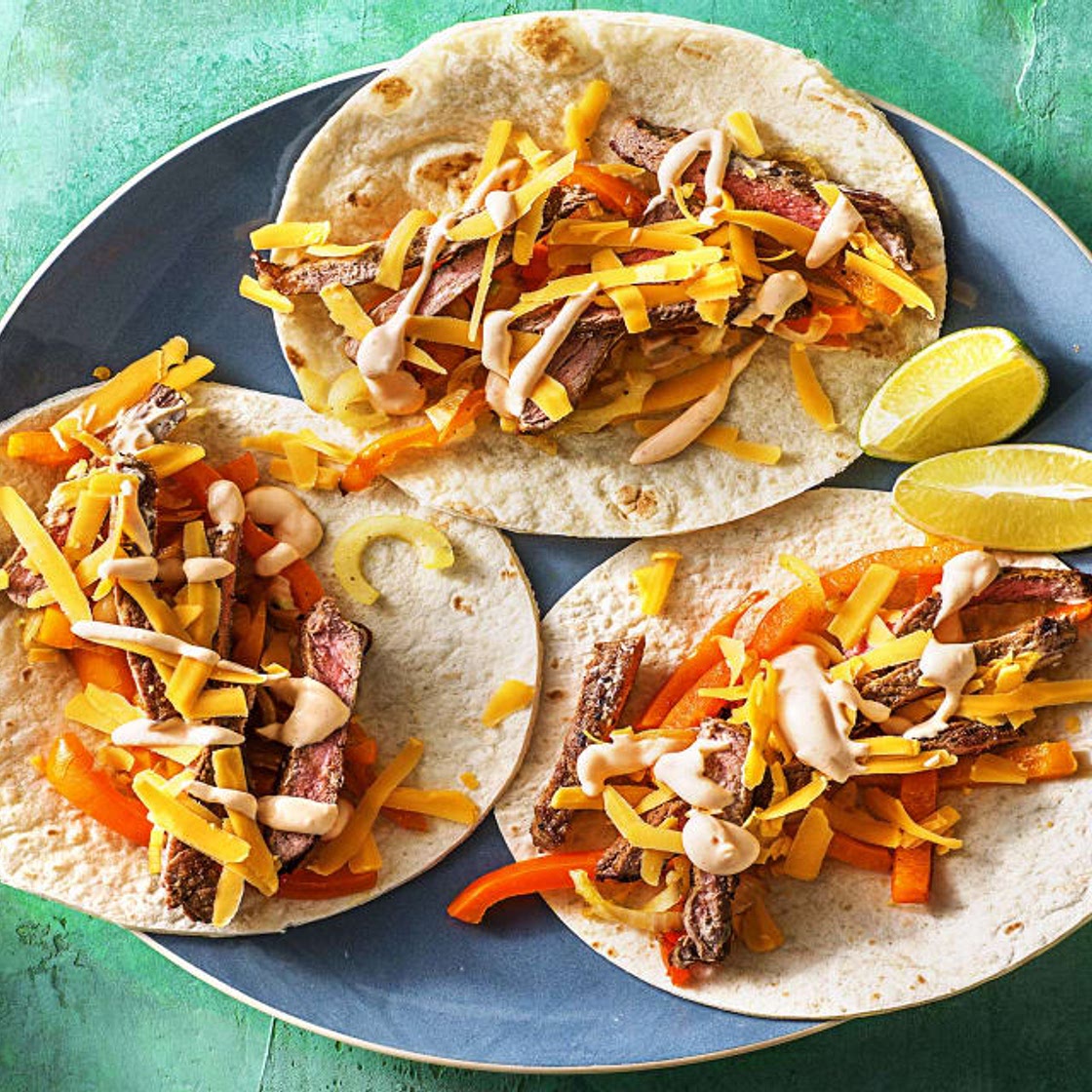 Speedy Steak Fajitas with Bell Peppers & Hot Sauce Crema