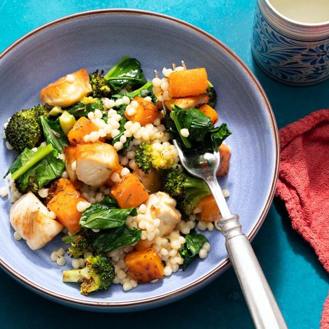 Couscous salad with chicken, butternut squash, and broccoli leaves