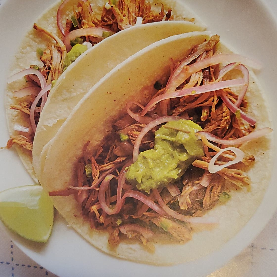 CITRUS-MARINATED PORK TACOS WITH PICKLED ONIONS