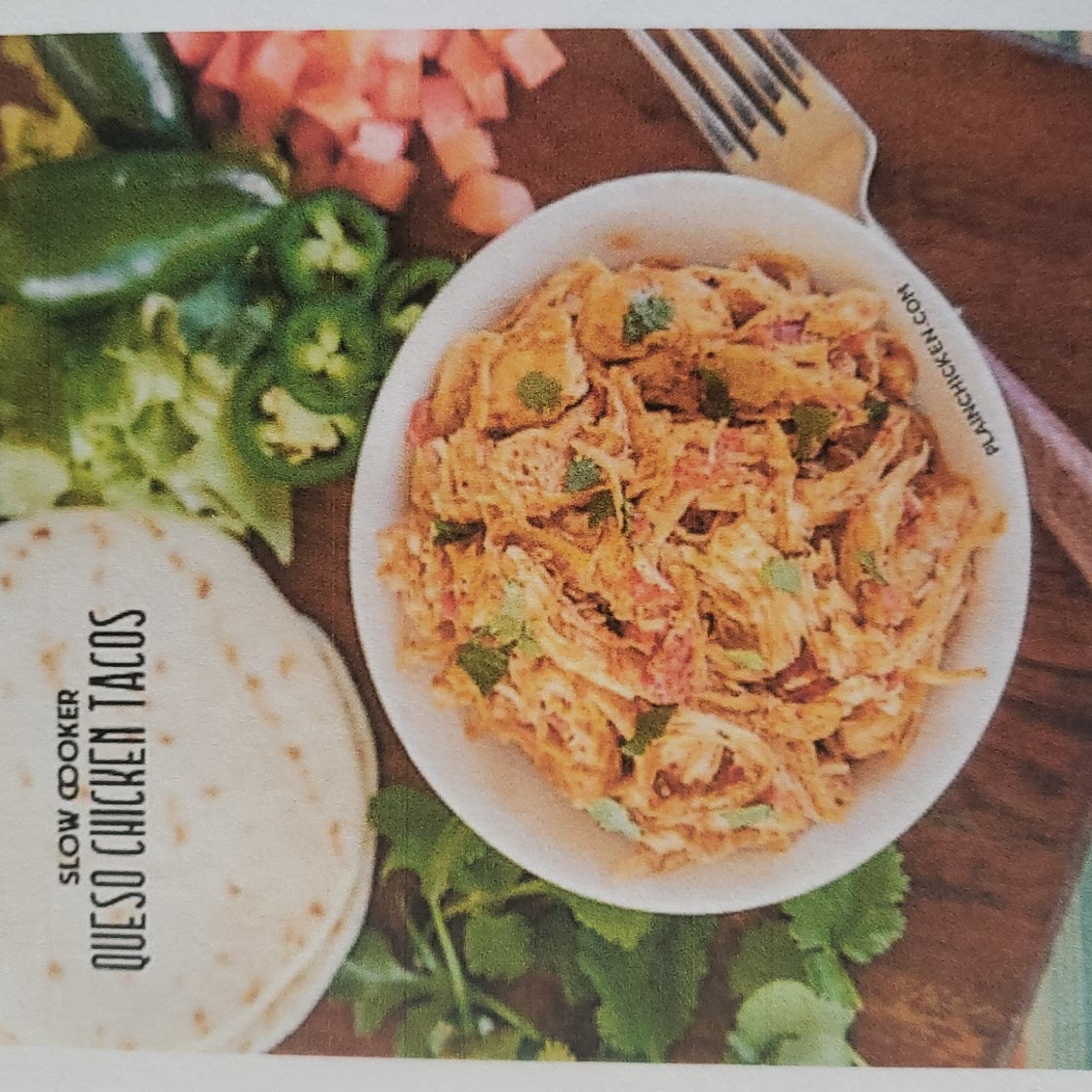 SLOW COOKER QUESO CHICKEN TACOS