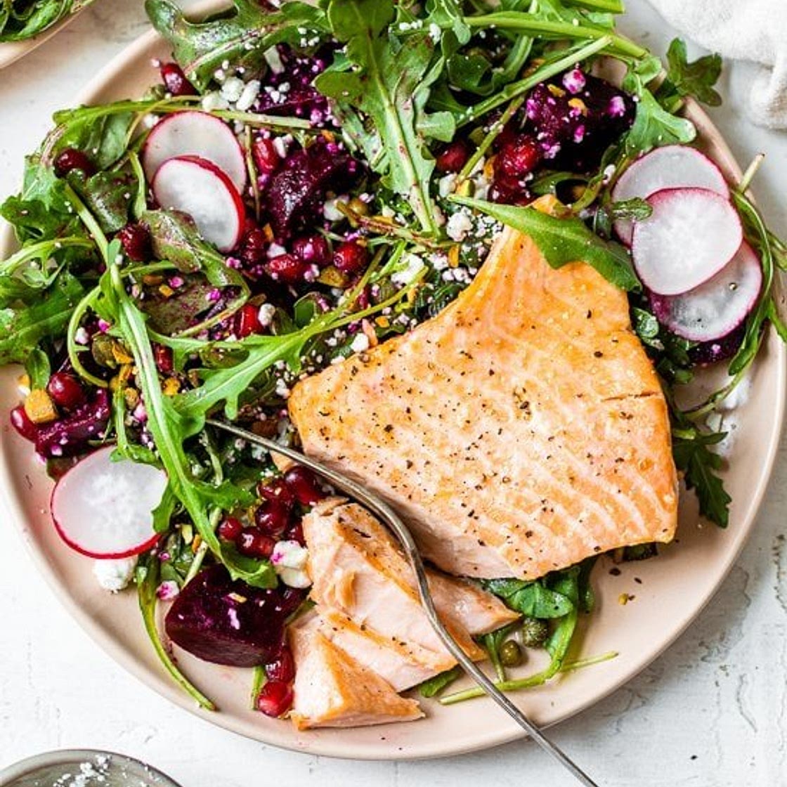 Salmon, Beet, and Arugula Salad with Pistachios and Pomegranates