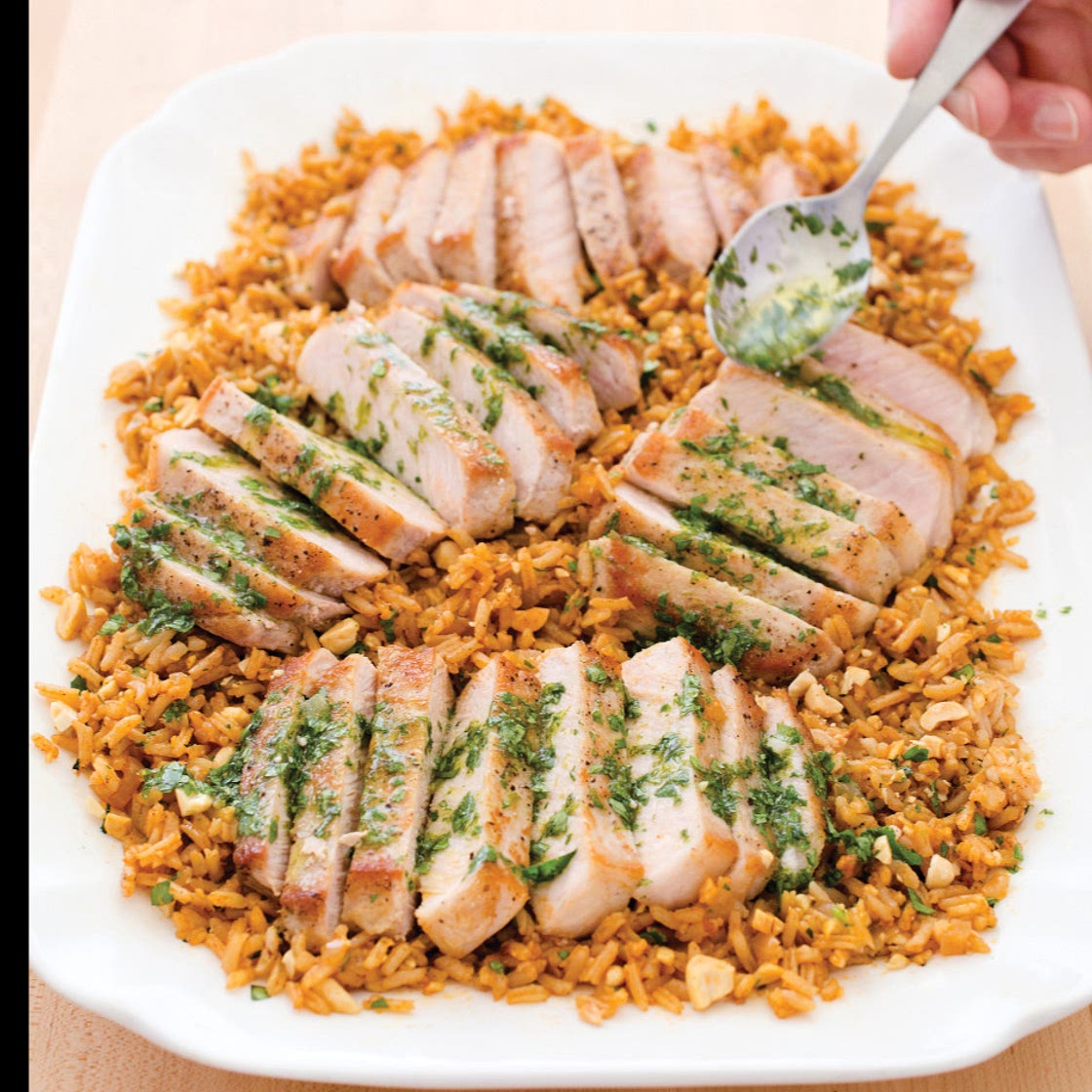 PORK CHOPS WITH CHILE RICE AND PEANUTS