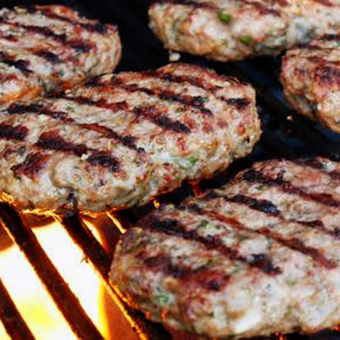 GREEK-STYLE LAMB BURGERS WITH RED ONION QUICK PICKLE, GARLIC MAYONNAISE, AND CUCUMBER SALAD