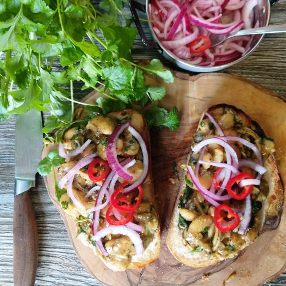 Cheesy Curried Butterbeans on Sourdough Toast