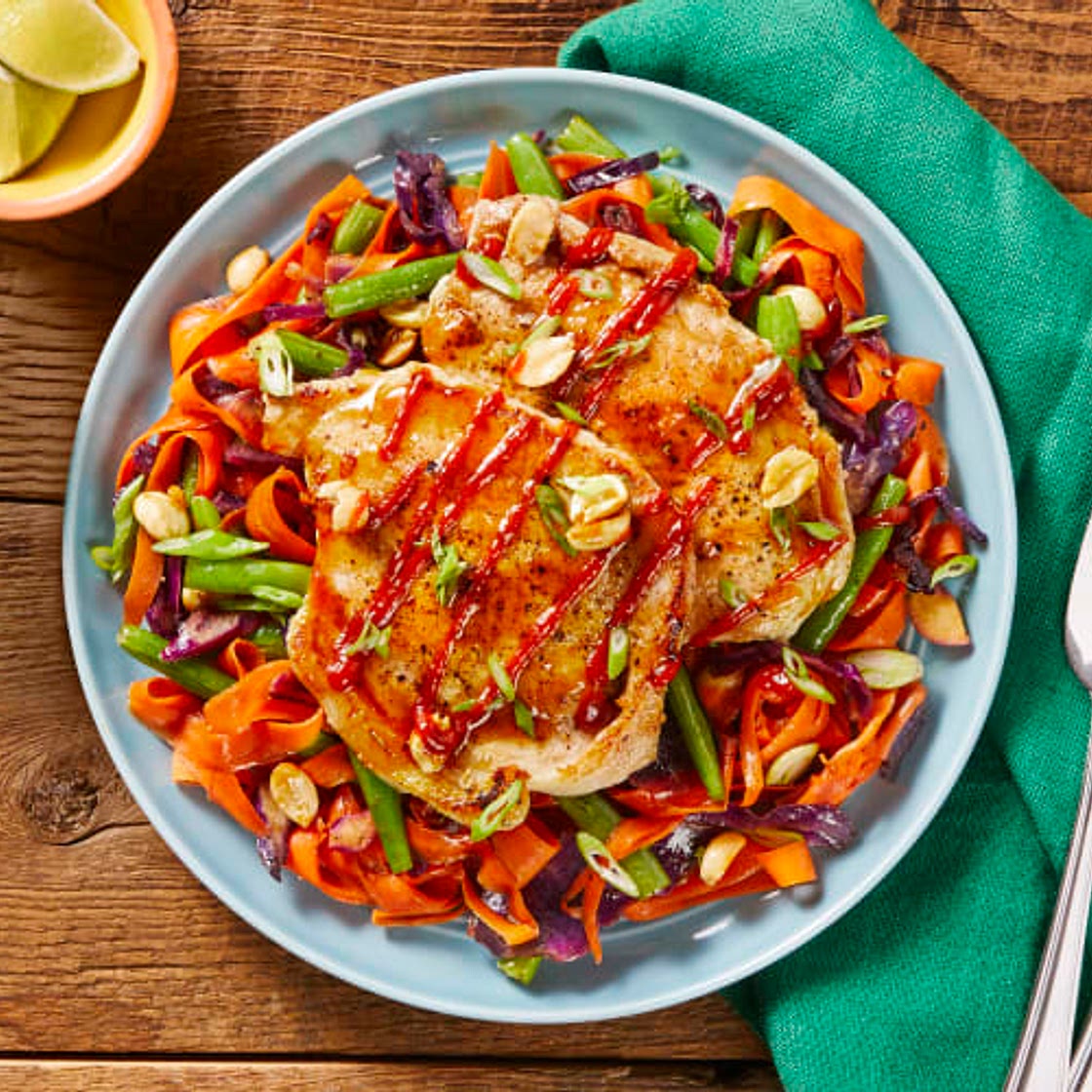 HF - Bulgogi-Glazed Pork over Veggie Stir-Fry
garnished with Candied Peanuts