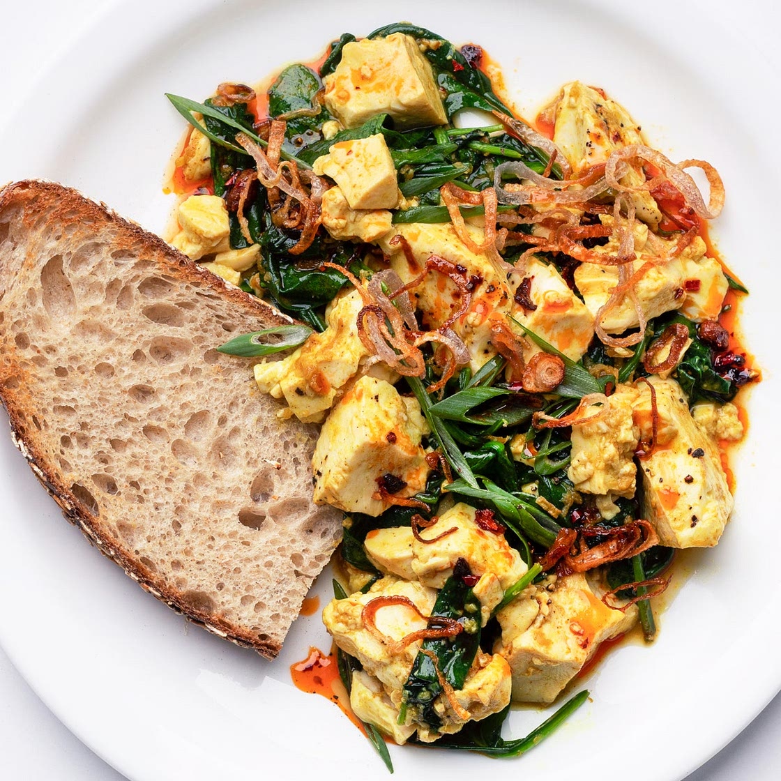 Ginger-Scallion Tofu Scramble With Spinach and Chili Oil