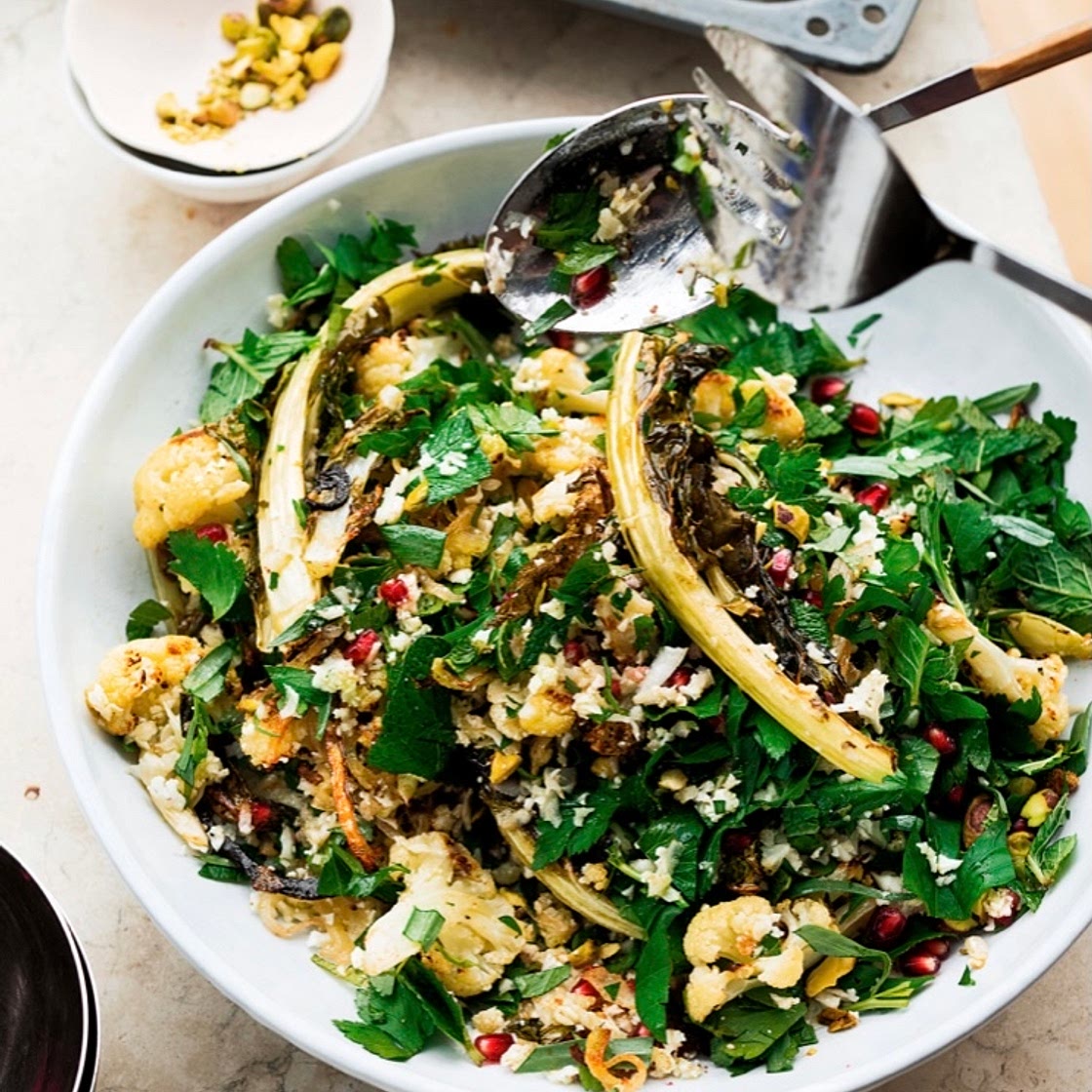  cauliflower, pomegranate, and pistachio herb salad. 