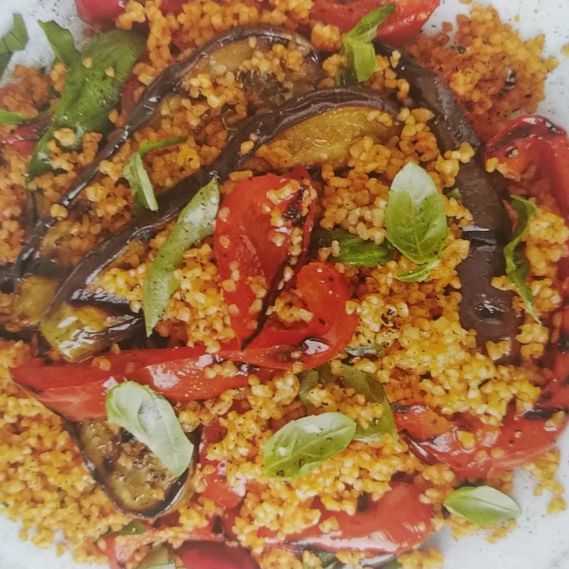 Charred aubergine, pepper & bulgar salad
