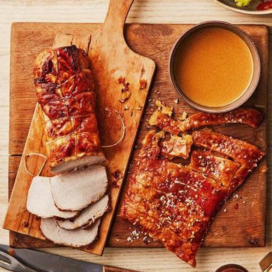 Herb-roasted pork in milk with crackling