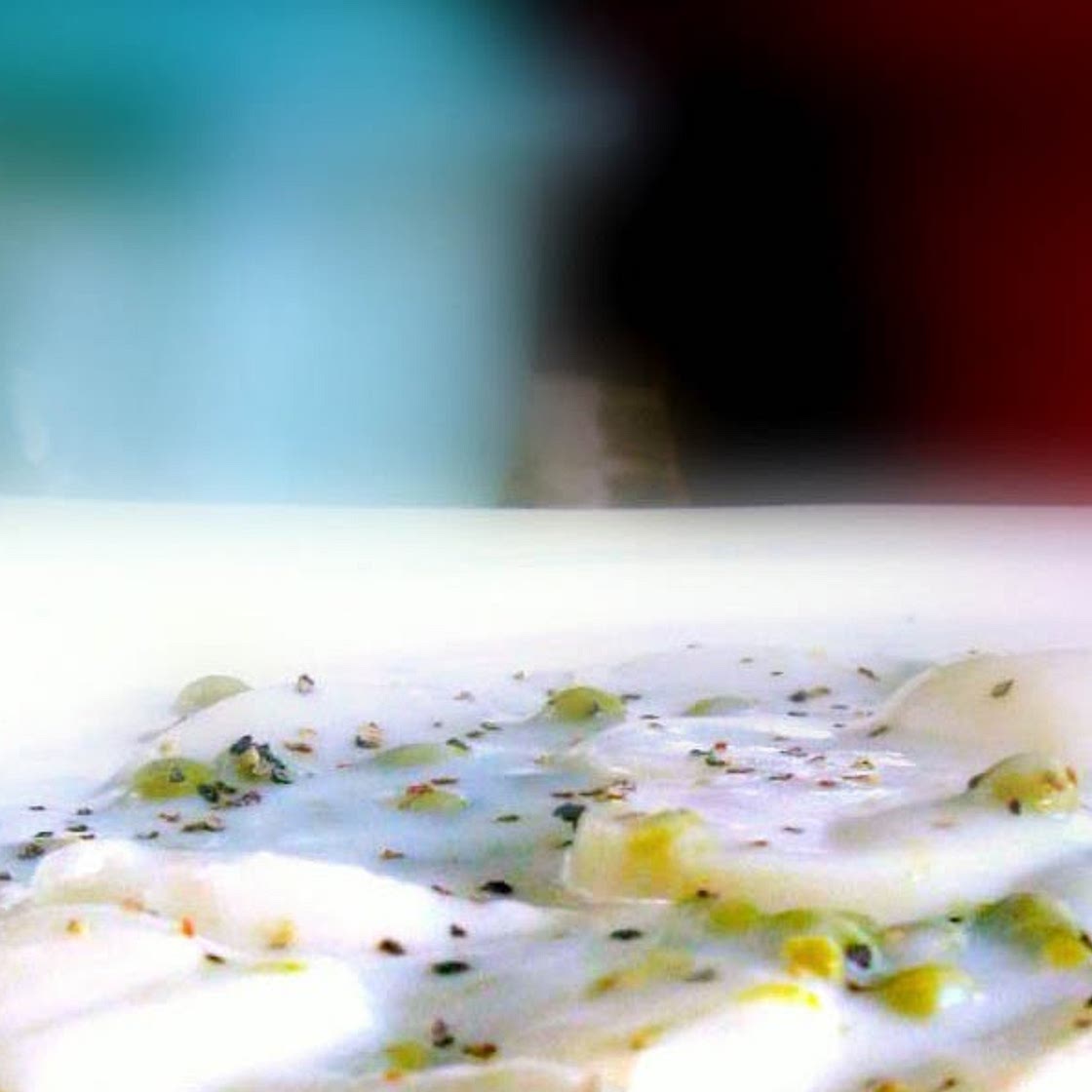 Old Fashioned Creamed New Potatoes and Peas in a White Sauce