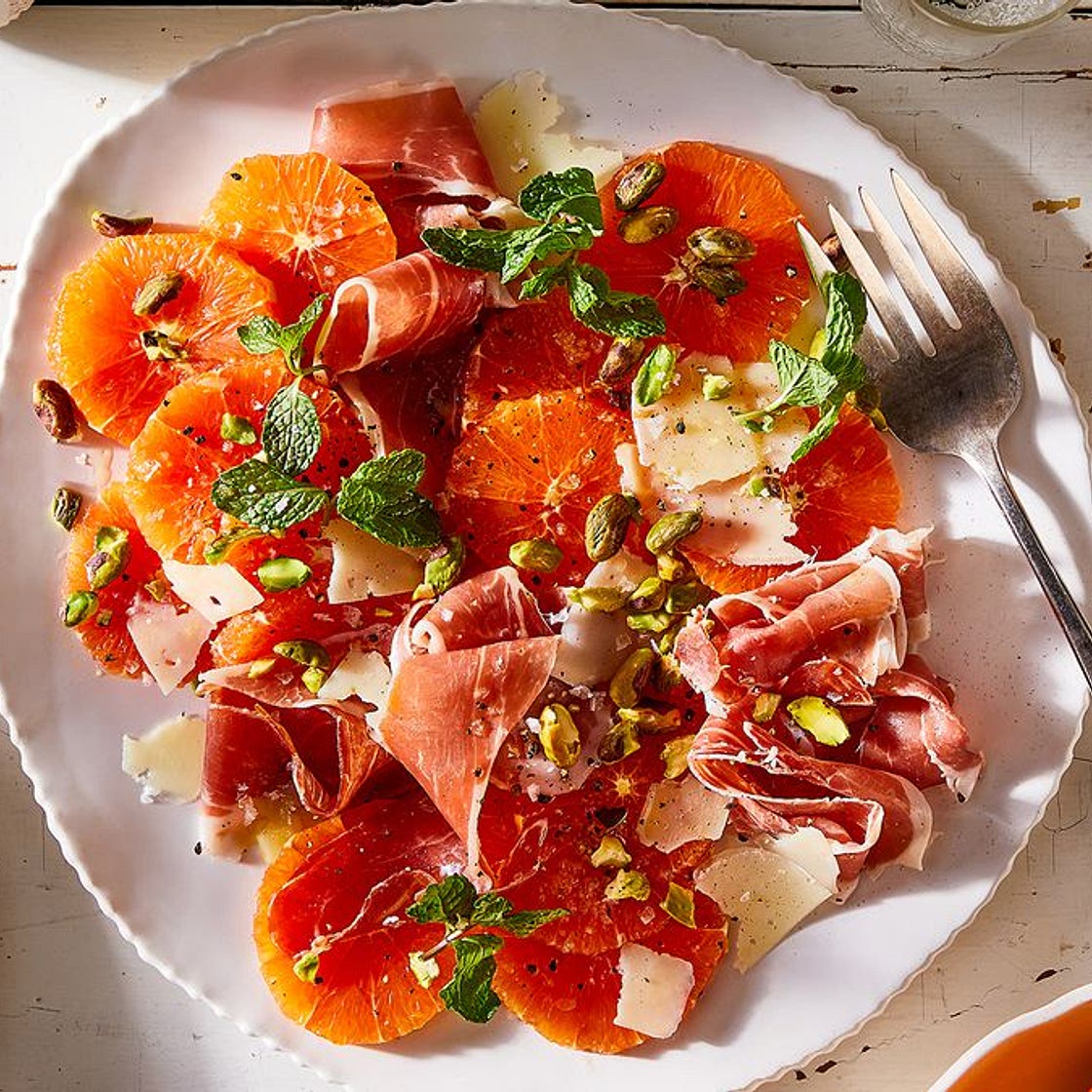 Dressed-Up Cara Cara Oranges With Prosciutto & Pistachios
