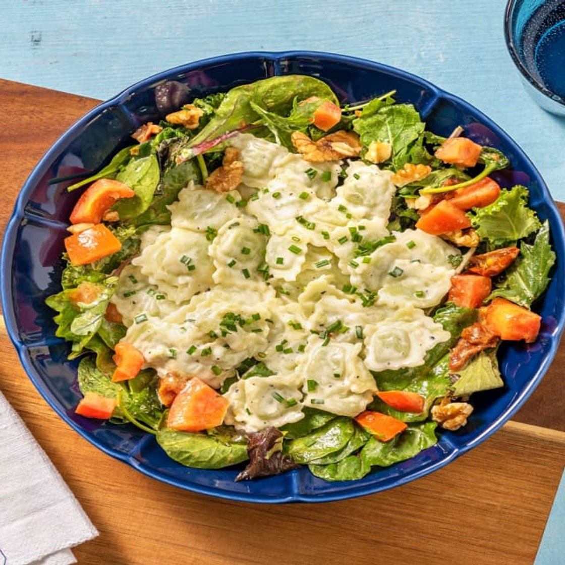 Ravioles du Dauphiné, crème ciboulette et salade