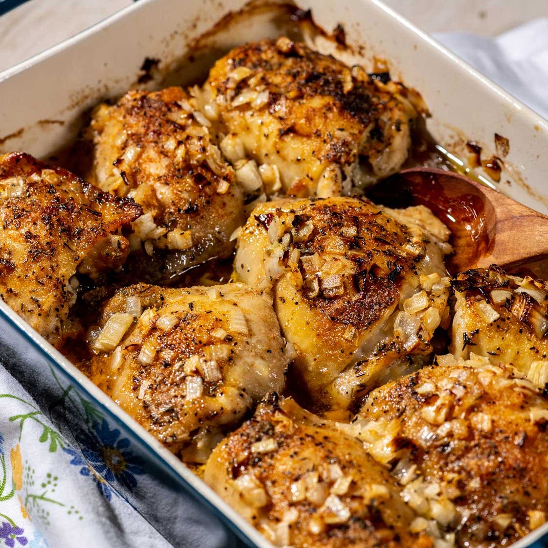 Baked chicken thighs with butter and onions are an ode to a childhood spent cooking with Mom